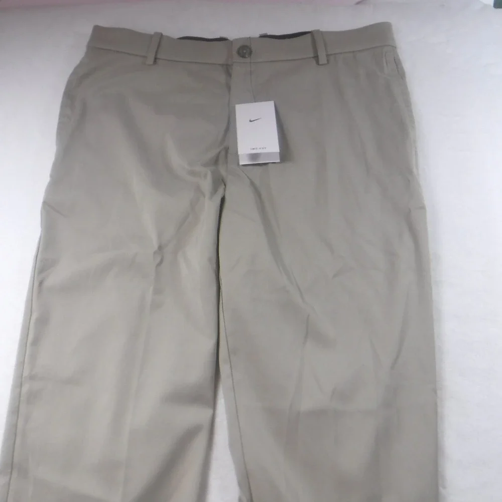Nike Dri-FIT Mens‎ Golf Pants Khaki Tan Flat Front Stretch Trousers Size 36 x 35